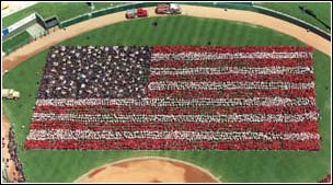15,000 people in red white and blue t-shirts show their support in honoring the victims....